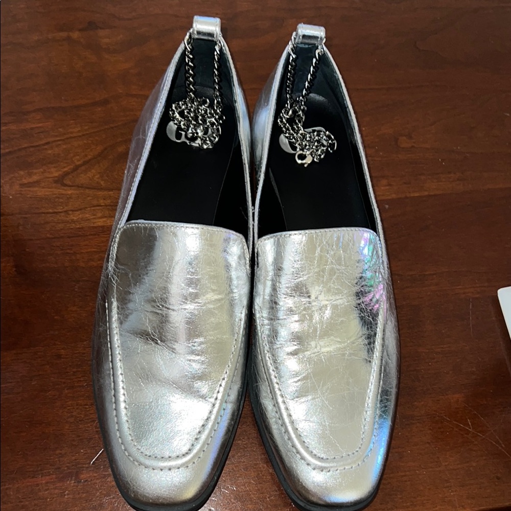 Gianni Bini Silver Flats with Sleek Design and Slip-On Style